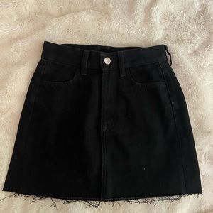 Black denim mini skirt